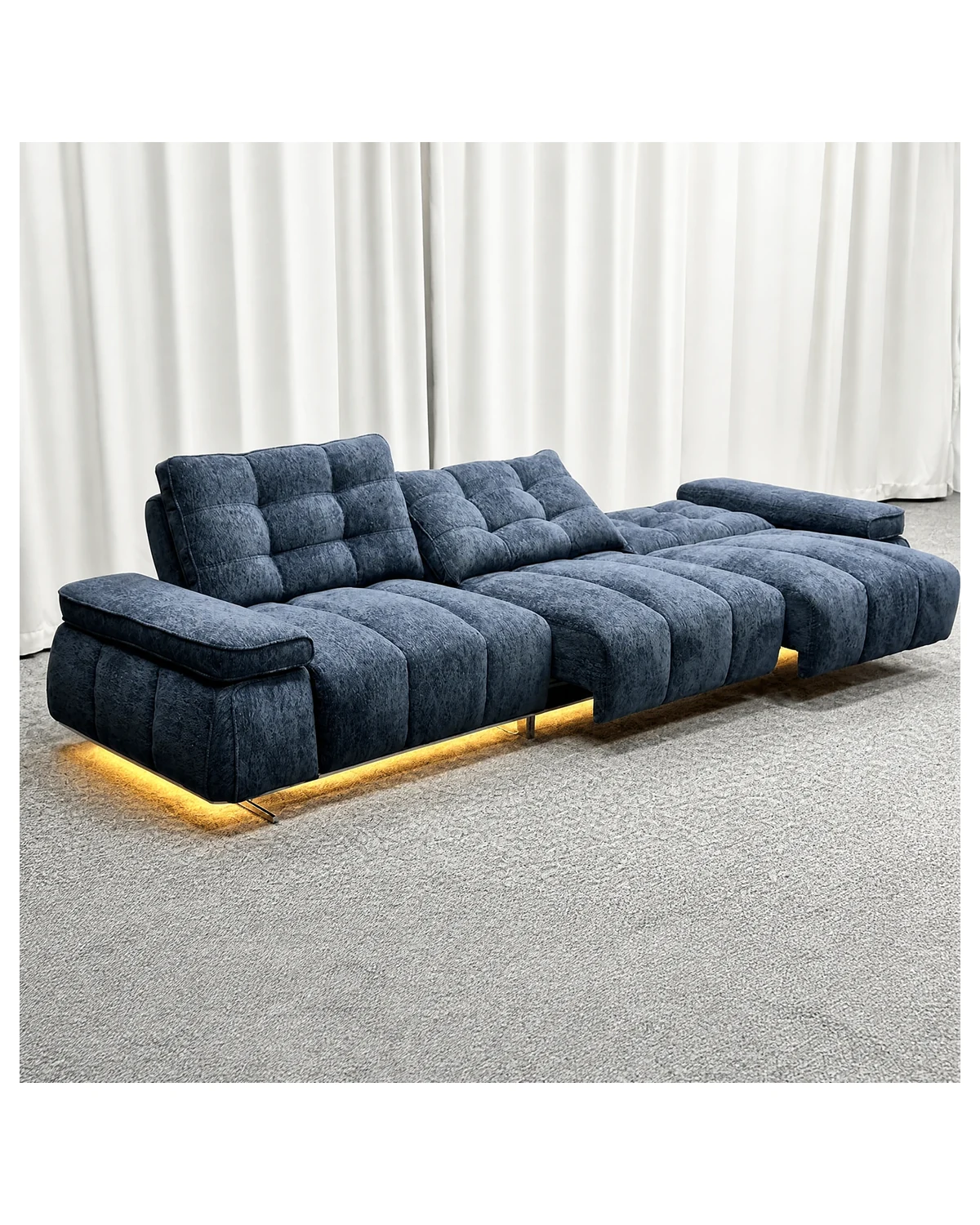 Navy blue electric sectional sofa with LED underglow, studio shot