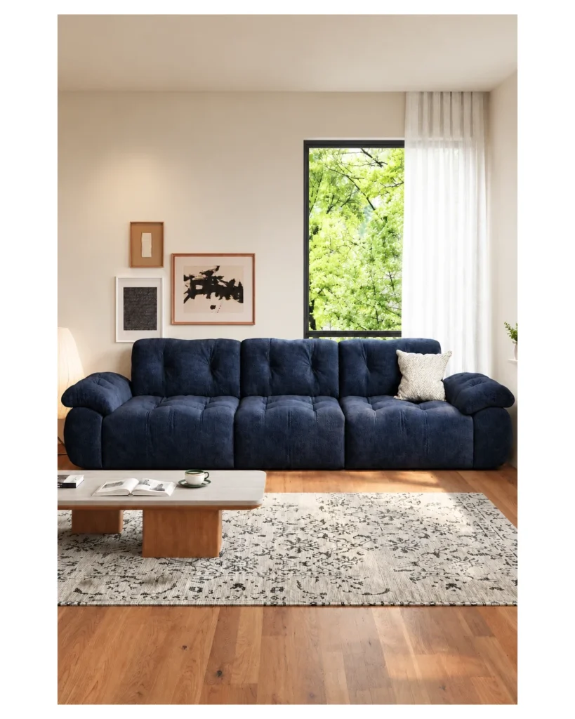 Navy blue snow velvet modular sofa with fully removable covers, in a bright living room