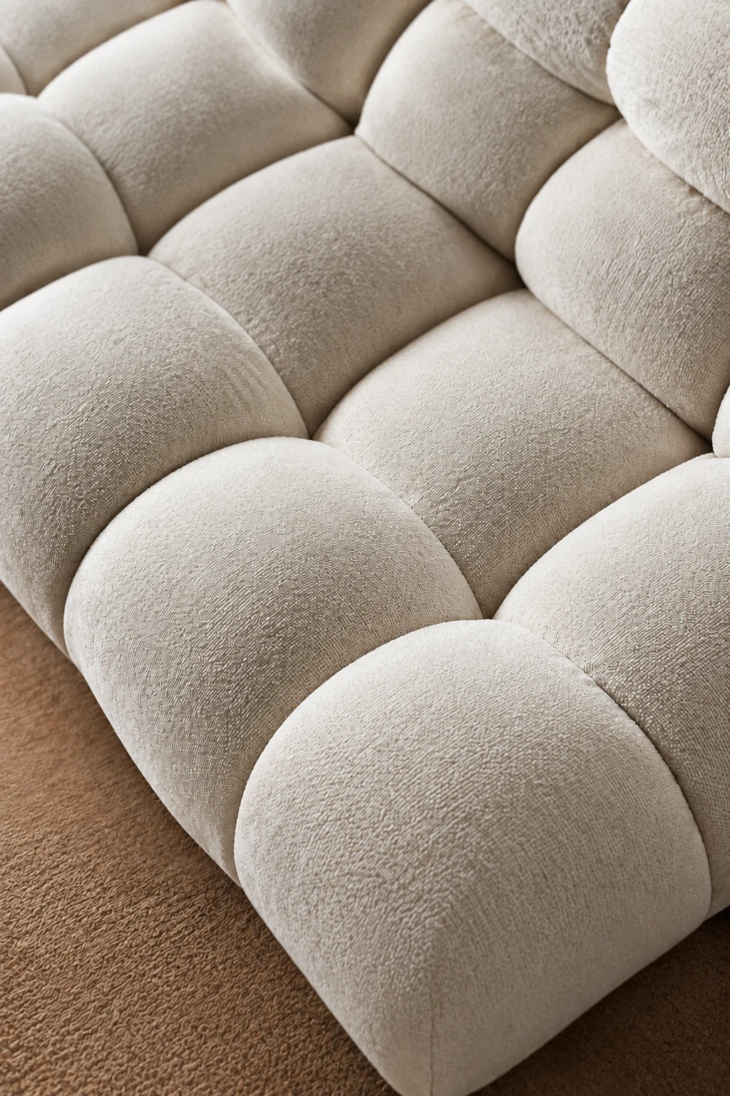 Close-up of the cream snowflake corduroy upholstery