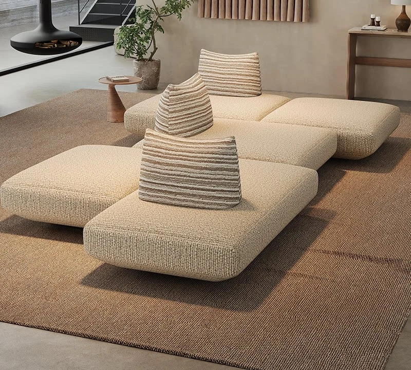 Free-form modular sofa with a sculpted chaise module